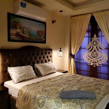 רוואלפינדי The Millenial Apartments & Suites Bahria Town מראה חיצוני תמונה