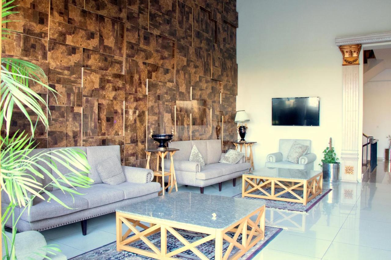 רוואלפינדי The Millenial Apartments & Suites Bahria Town מראה חיצוני תמונה