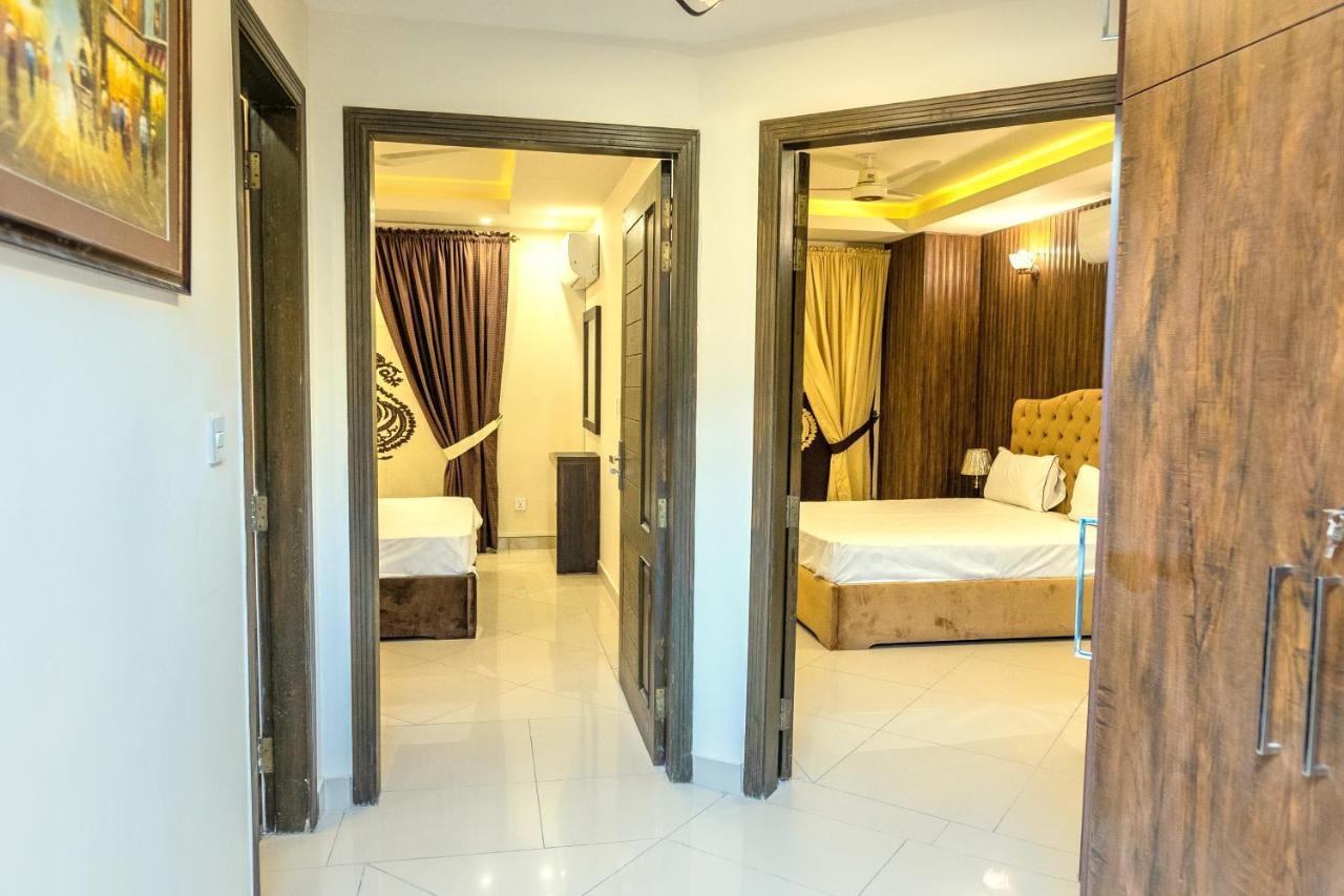 רוואלפינדי The Millenial Apartments & Suites Bahria Town מראה חיצוני תמונה