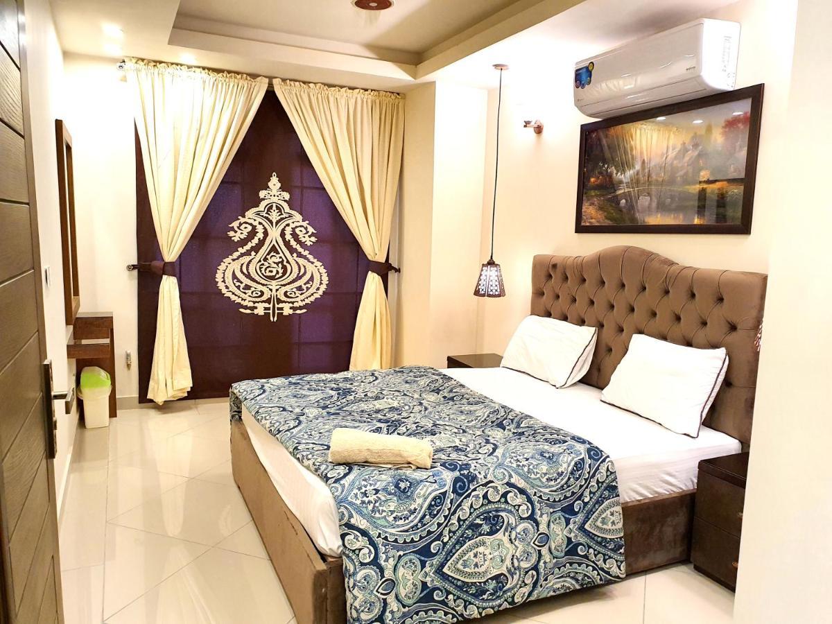 רוואלפינדי The Millenial Apartments & Suites Bahria Town מראה חיצוני תמונה