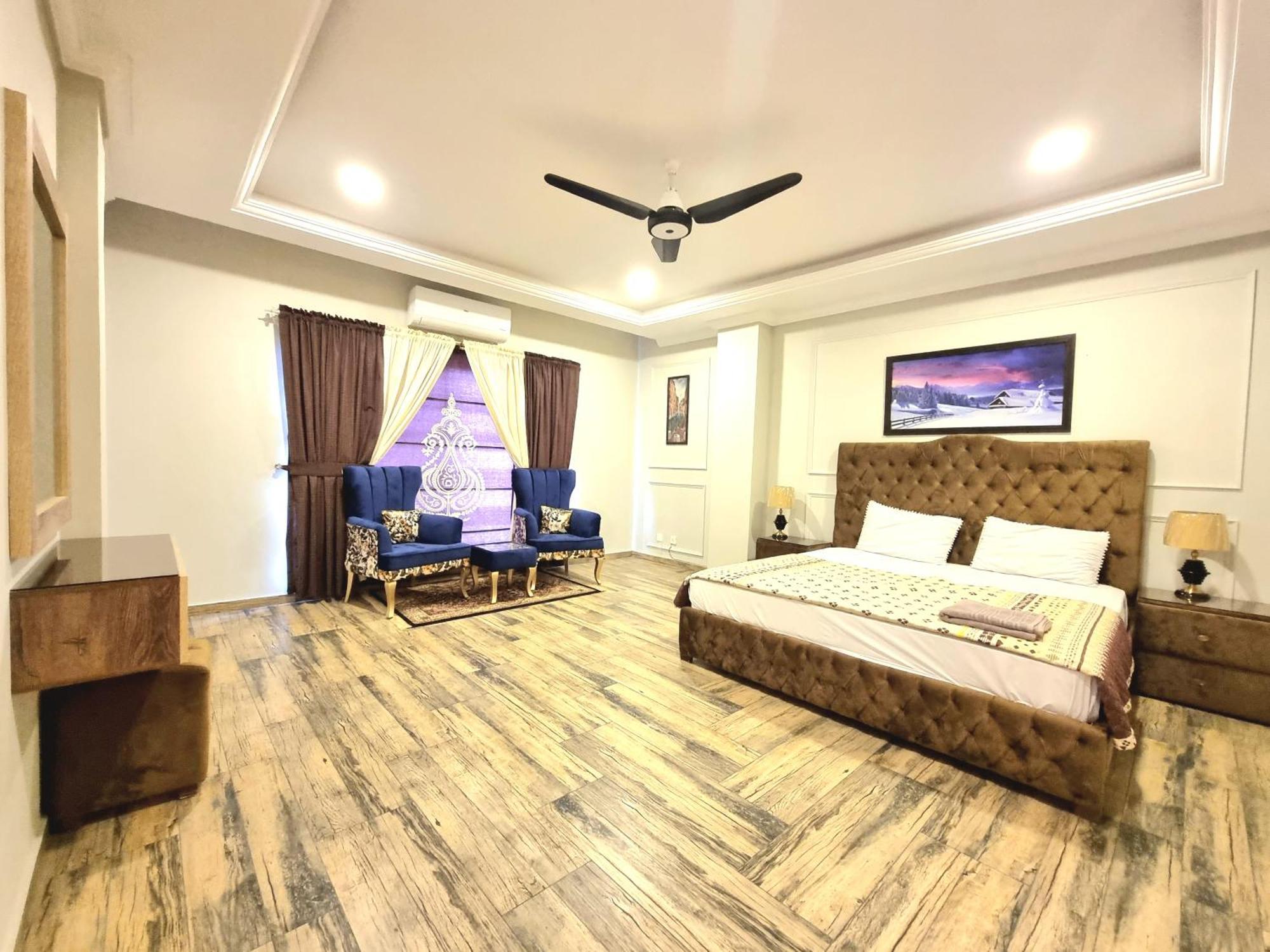 רוואלפינדי The Millenial Apartments & Suites Bahria Town חדר תמונה
