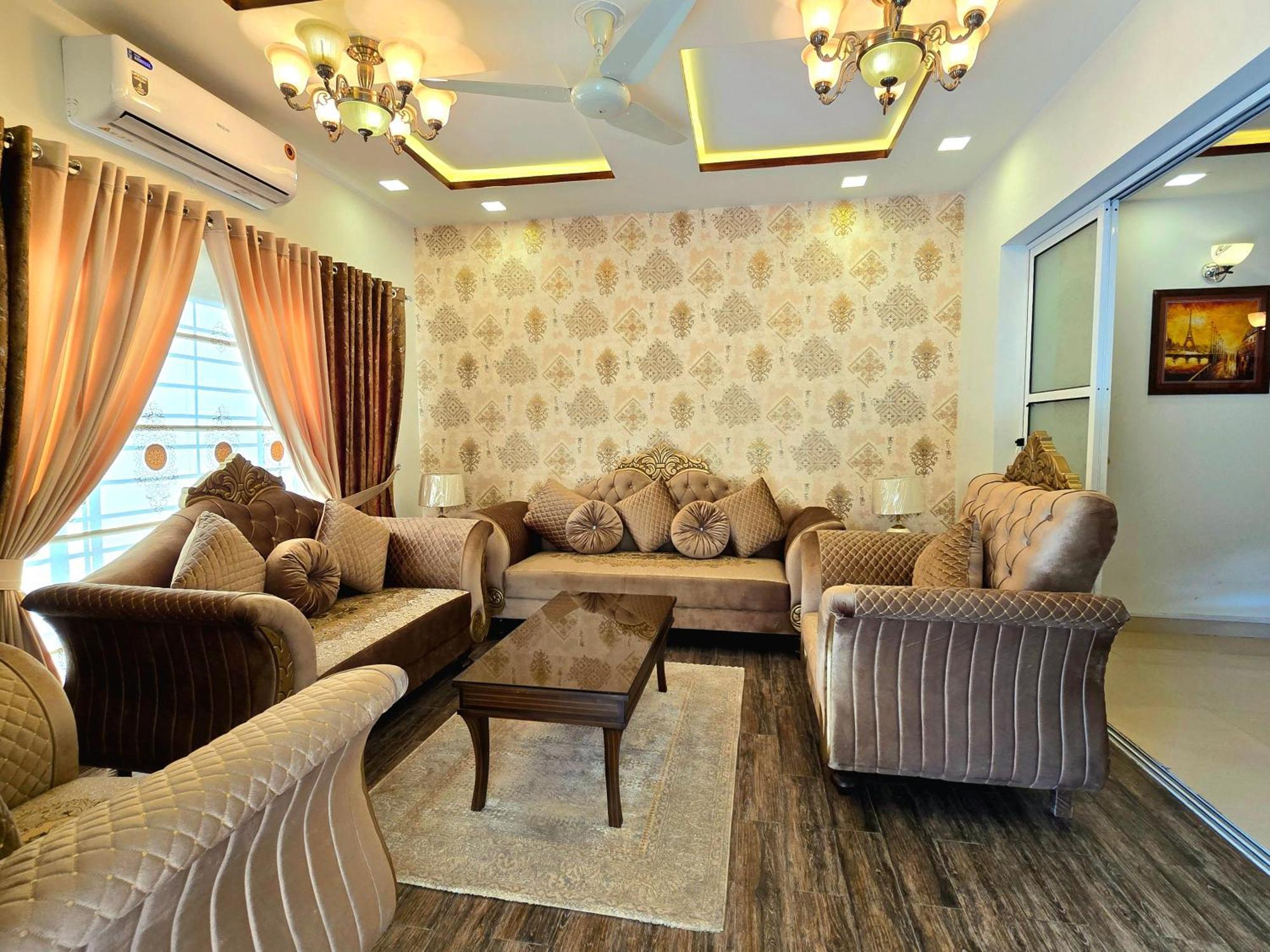 רוואלפינדי The Millenial Apartments & Suites Bahria Town חדר תמונה