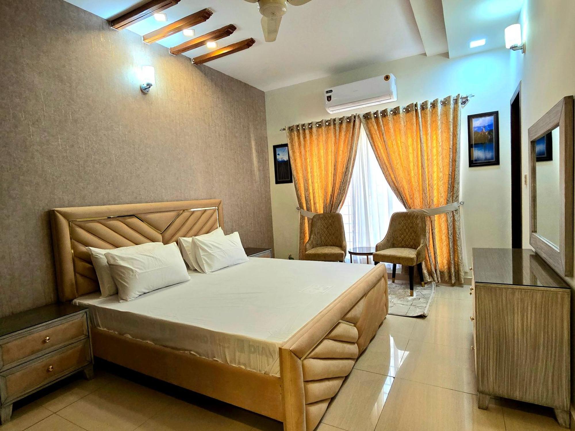 רוואלפינדי The Millenial Apartments & Suites Bahria Town חדר תמונה